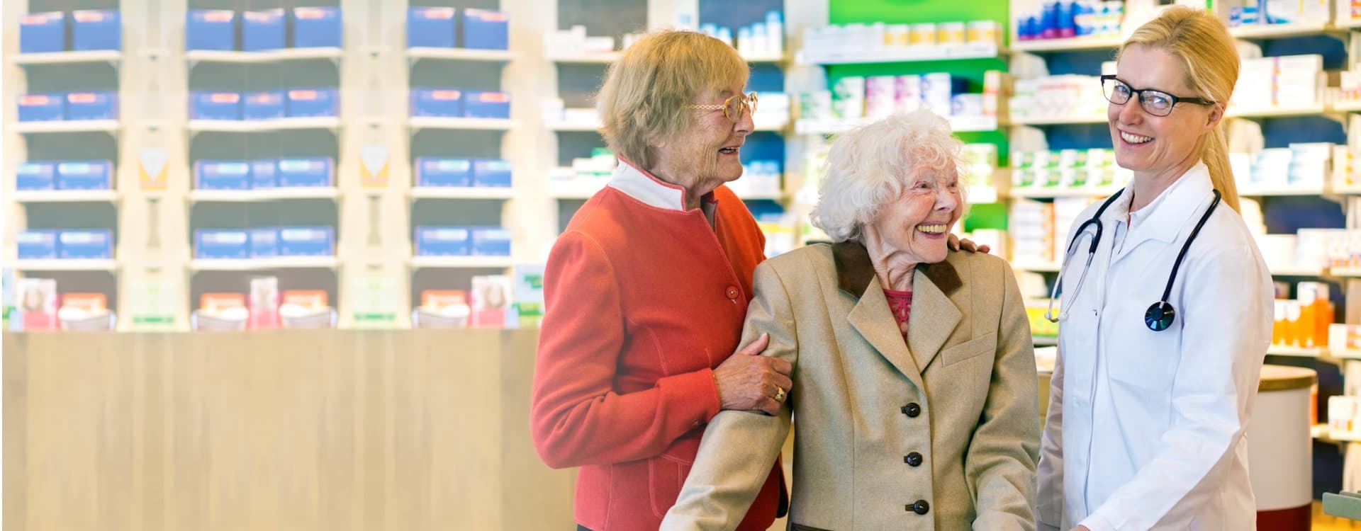 senior women with a pharmacist