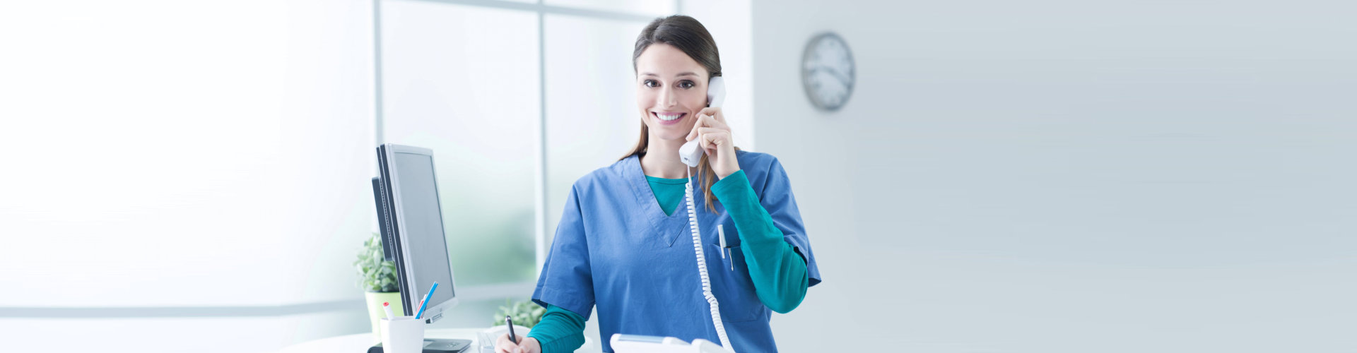 nurse answering a telephone call